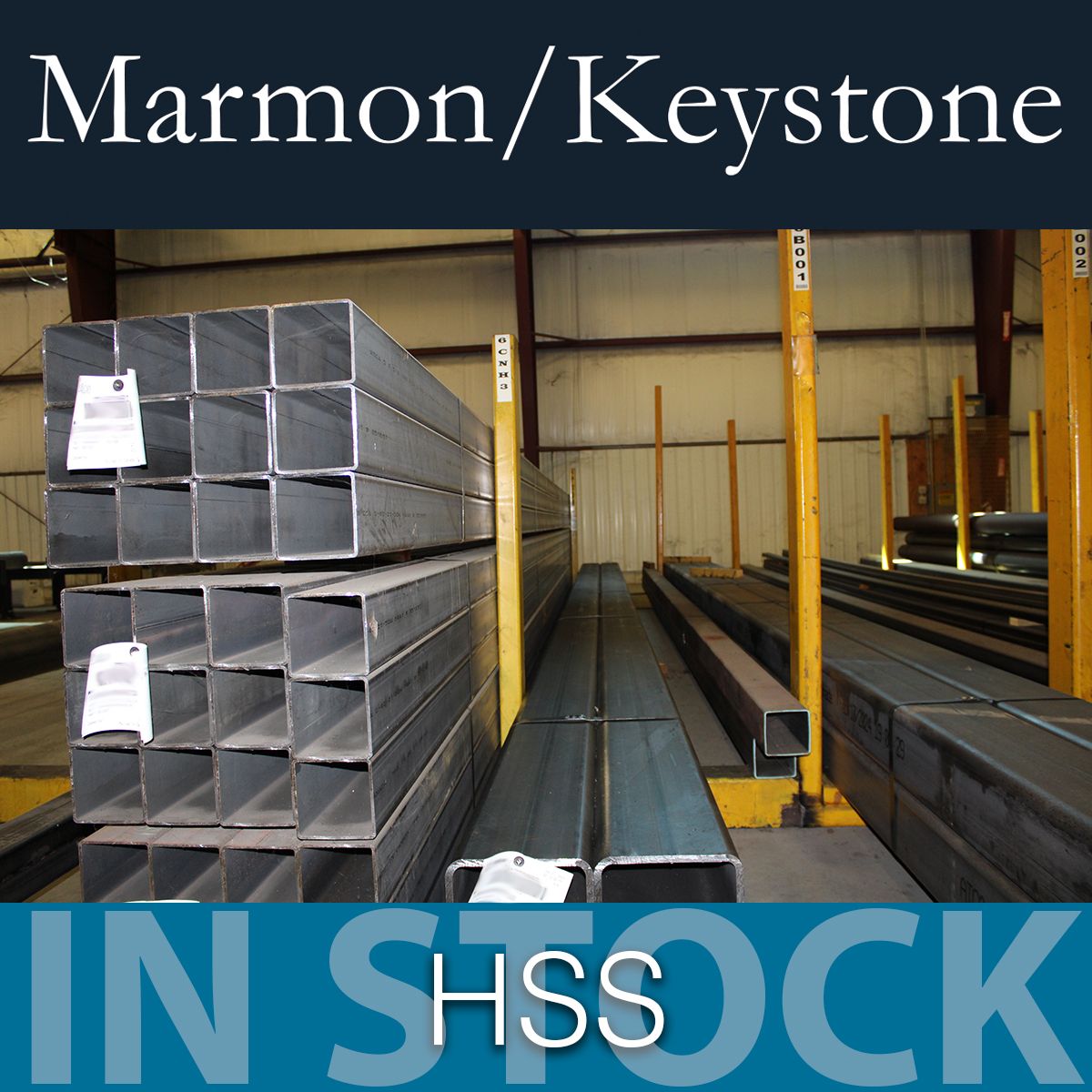 Marmon Keystone Stacks of rectangular steel tubing are arranged on racks inside a warehouse. A Marmon/Keystone sign is displayed at the top, highlighting their role as a leading metals distributor. The words "IN STOCK HSS" appear at the bottom of the image.